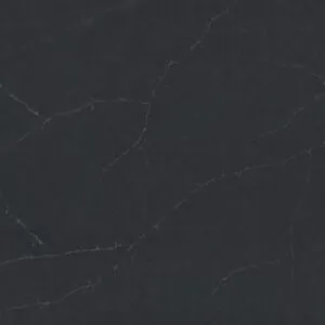 Produktbild på sten till bänkskiva, Charcoal Soapstone från cosentino. En grå kompositsten med ljus ådring.